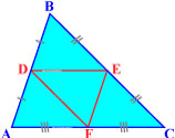 Средняя линия треугольника — это отрезок, соединяющий середины двух сторон треугольника